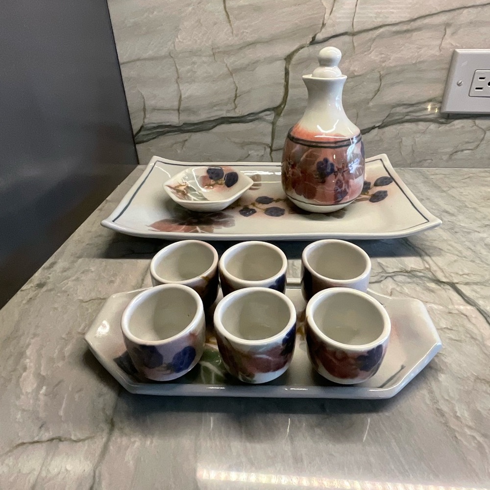 Sake, tea set,porcelain,beautiful design.Perfect condition .No chips . 10pieces